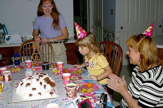 Kristen blowing out the candles