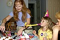 Lisa cutting Cake