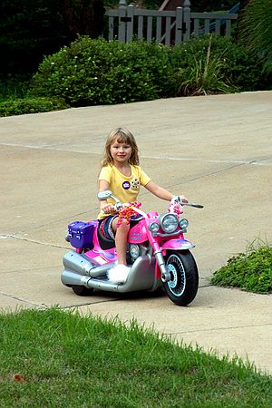 Kristen playing on Motorcycle