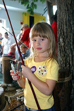 Kristen holding fishing pole